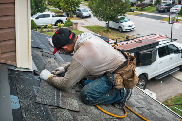Professional Roofing technician working in Northwood, ND